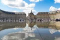 La place de la Bourse se reflétant dans le miroir d'eau